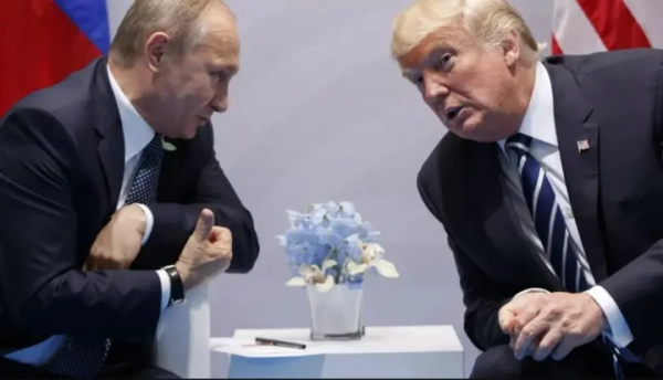 Трампа і Путіна, які залишають Аляску