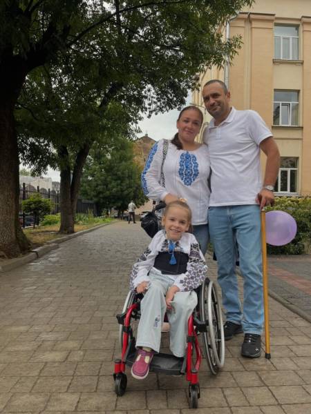 Вікторія Полюга з батьками